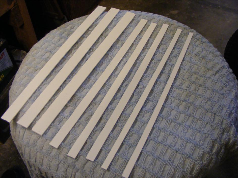 Here I cut the strips that I will use to make the hatch hold down system from sheet plastic
