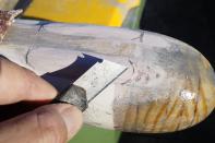Click image for larger version

Name:	using a knife to reshape blisters.jpg
Views:	92
Size:	46.7 KB
ID:	109315