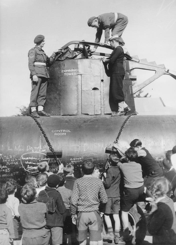 Click image for larger version

Name:	Children_inspecting_a_Japanese_midget_submarine,_1942_(3702945655)1.jpg
Views:	1
Size:	93.1 KB
ID:	68579