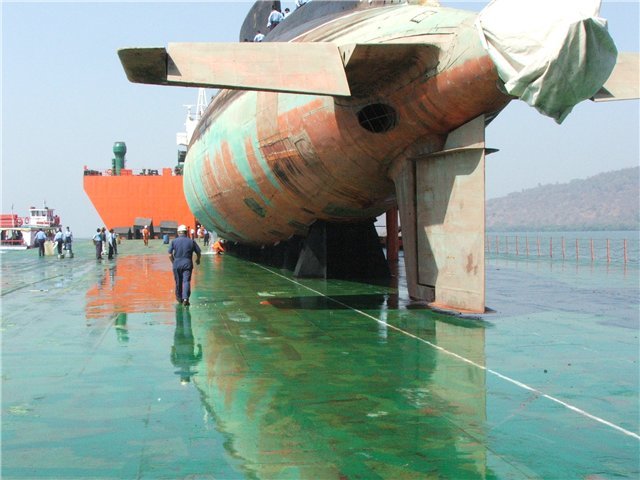 Click image for larger version

Name:	Kilo on barge.jpg
Views:	2
Size:	57.3 KB
ID:	83955